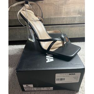 Black Fashion Nova heels with anklet attached